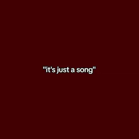 A square cover image with a dark maroon background. Centered on the image is the text "it's just a song" in white. The text is in a sans-serif font.