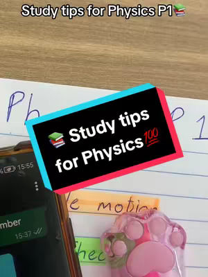 The image shows a close-up of a desk with a book titled "Physics", a smartphone, and a few other objects, with a colorful text overlay labeling the content as study tips. The background appears to be a wood-textured table.