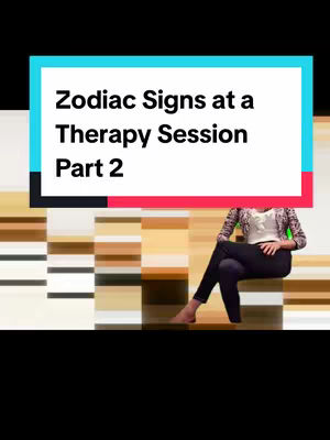 The image features a stylized design with a central rectangular area overlayed with text on a vibrant background.  A person, appearing to be a woman, is seated to the right side. The central text block presents 'Zodiac Signs at a Therapy Session, Part 2' in large, bold white font. The background is a horizontal arrangement of color rectangles, generating depth. A portion of a person in a patterned blazer, sitting in a relaxed pose, is partially visible. The overall image is set against a black background.