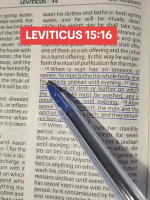 The image is a close-up shot of an open Bible page. Text is visible, with some passages underlined. A red rectangular overlay with white text that reads 'LEVITICUS 15:16' is placed at the top. A pen is angled across the page, adding a visual guide to the text.