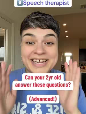 A selfie-style image of a person with short, dark hair, looking directly at the camera with a wide smile. The person's hands are raised in a gesture, and overlayed text appears in the image.