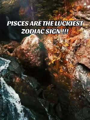 A scenic image featuring a rocky waterfall, with cascading water and green foliage. The text overlayed, written in bold white letters, says "Pisces are the luckiest zodiac sign!!!". The lighting is bright, giving the overall image a natural and appealing look.