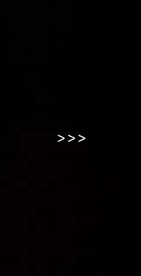 A black background with three white chevrons, pointing to the right, centered horizontally and vertically.