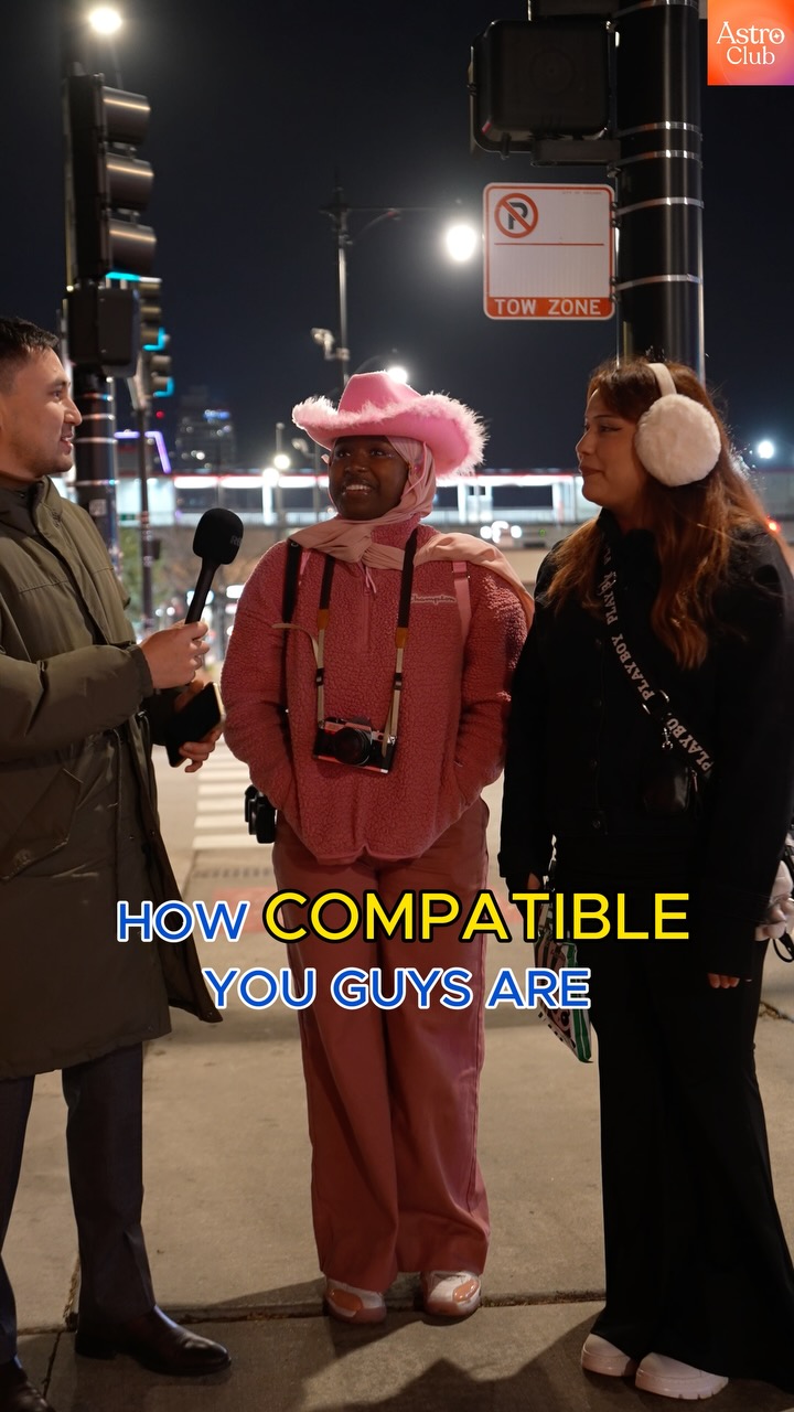 A scene from a street interview at night. A person with a microphone interviews two people who appear to be friends. The text overlay asks if they are compatible. The Astro Club logo is in the top right corner.