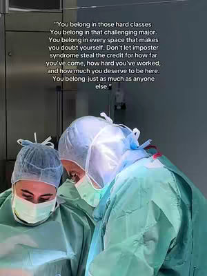 Two individuals are shown in an operating room setting with surgical attire. One with their head down, the other slightly turned. A gray wall makes a background and text is superimposed over the image.
