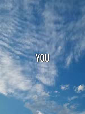 The cover image is a photograph of a blue sky filled with puffy white clouds. The word "YOU" is superimposed in the center of the image in a white font with a black outline.