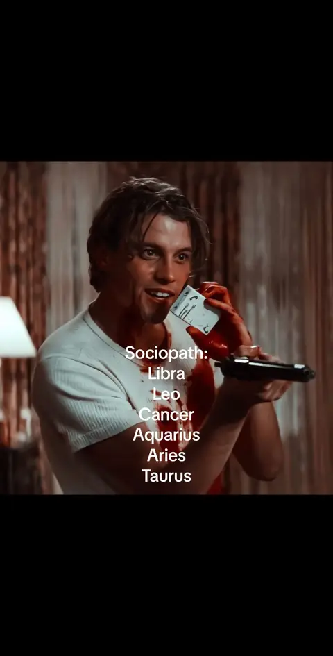 The cover image depicts a man holding a playing card and a gun, with blood splattered around. Overlayed text lists zodiac signs and their association with sociopathy.