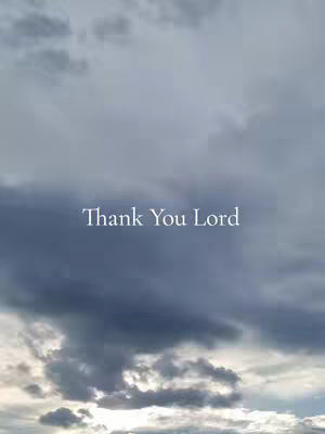 The cover image displays a partly cloudy sky with varying shades of gray and blue. The text "Thank You Lord" is centrally positioned, using a white, clean font. The overall composition is a simple, serene, and spiritual portrayal of the sky.