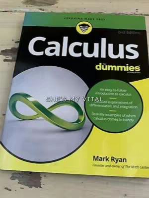 A cover of the book "Calculus for Dummies" is displayed on a light wooden surface. The book is open, with a green and black cover featuring the title in large, bold white font. The cover also includes an image of an infinity symbol.