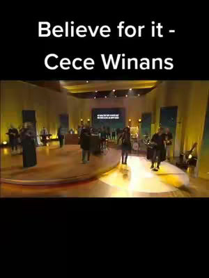 The cover image features text that reads 'Believe for it - Cece Winans'. The background shows a stage setting with a band and singers illuminated by stage lights. The overall composition is focused on a performance setting.