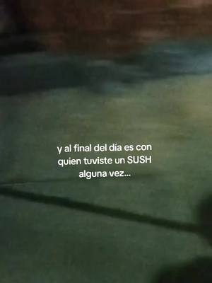 The image has a dark, blurred background with what seems to be a surface or object casting a shadow on the lower portions. White text is overlaid, with an emotional reference. The overall colors are muted, suggesting nighttime or low-light ambiance.