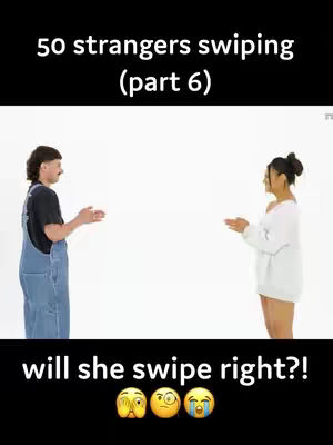 The image shows two individuals, a man and a woman, standing opposite each other against a plain white backdrop. The man, on the left, wears a denim jumpsuit and a black t-shirt; the woman on the right is in a white sweater and shorts. Above the couple: the text '50 strangers swiping (part 6)'. Beneath them: 'will she swipe right?!' accompanied by three emojis with different expressions.