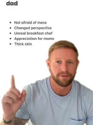 A man with a beard and light blue shirt looks up at the camera, with a raised index finger. Above him is a list of text with the title "dad".