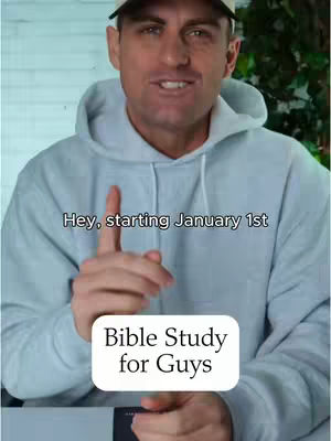 A man wearing a light blue hoodie and a baseball cap points his right index finger towards the viewer. Overlaid on the image are the words 'Hey, starting January 1st' at the top and a white rectangular box that says 'Bible Study for Guys'. Behind him is a blurred green and off-white background.