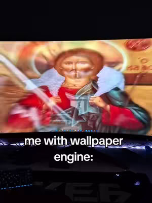 The cover image displays a computer monitor showing an image of a religious figure, likely a saint or a depiction of Jesus. Overlayed at the bottom of the screen is white text against a black background.