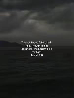 The image shows a dark, moody landscape with a blurred sky and water. Overlayed on the image is a text quote in white font.