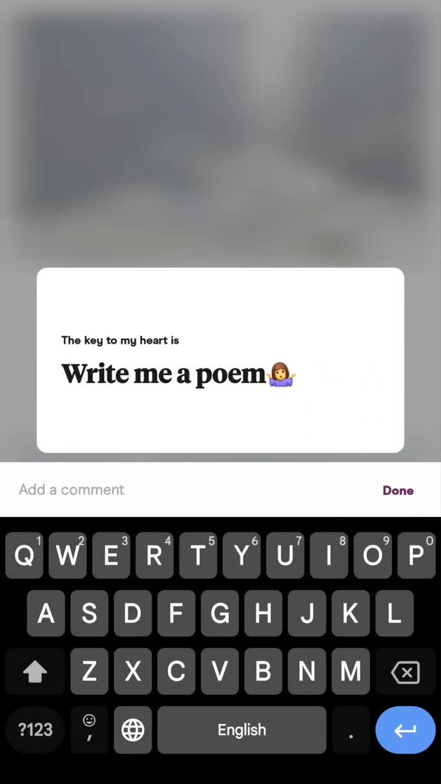 The image is a screenshot of a comment section on a digital platform, likely a phone interface. The background is blurred and has a gray gradient. The foreground prominently features a white rectangular text box with rounded corners, positioned towards the bottom of the frame. Inside the box, there is text with a combination of bold and regular fonts in a dark color. Below is an image of the keyboard.