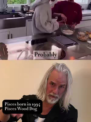 The cover image is split into two sections. The top half shows a kitchen scene where two people, one in a gray hoodie and the other in a maroon shirt, prepare food near a window. Below this, the bottom portion features a man with long, gray hair and a beard, wearing a black jacket, looking directly at the camera. Text overlays are present, with 'Probably' in the top section and 'Pisces born in 1994 Pisces Wood Dog' in a black box at the bottom.