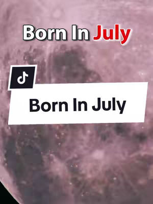 The image features a background resembling a blurred galaxy in shades of purple, with two text overlays. The top one reads 'Born In July' in a bold, white font with a red 'July.' The bottom overlay presents 'Born In July' on a white rectangular banner, accompanied by a TikTok logo.