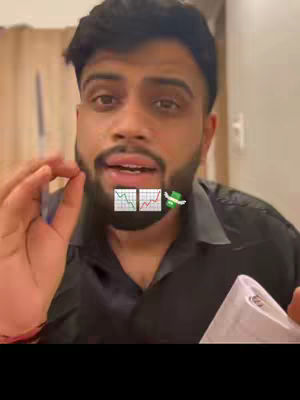 The cover image shows a man in a black shirt speaking, with animated financial chart graphics overlaid near his mouth. He is holding a paper in his right hand. The background appears to be an indoor setting.