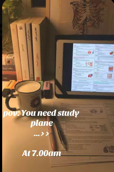 A well-lit, cozy study setup featuring stacked books, a mug of frothy liquid, a tablet displaying notes, and study materials. The image is warm toned, evoking a feeling of study.