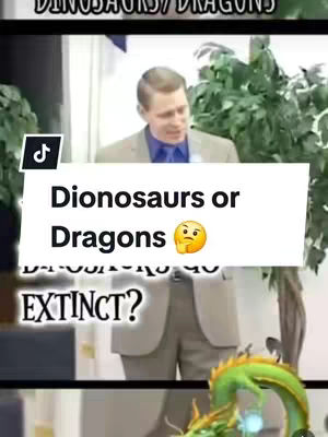 A man in a suit and tie is speaking against a backdrop. A superimposed white rectangle with black text and a thinking emoji covers his lower face area. A green dragon is in the bottom right corner.