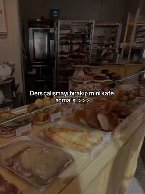 The image shows a cafe counter with various baked goods on display. The glass case reflects the interior of the cafe. Text overlays are present at the bottom, written in Turkish.