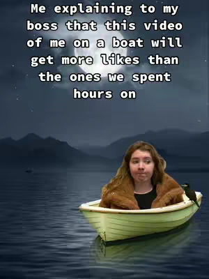 A woman sits in a small rowboat on dark water, facing the viewer. The background is a dark, shadowed landscape. Text overlays the image in a clean, white font.