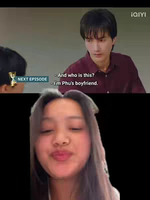 The cover image is a split-screen. The top half shows two male actors from a Thai Boys' Love series in a scene with subtitles in English. The bottom half shows a selfie of a young woman puckering her lips. The layout is vertical, with the series clip at the top and the selfie at the bottom.