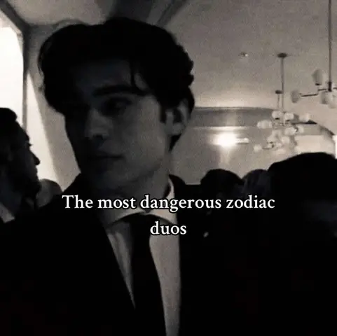 A grayscale image of a man in a suit, looking slightly off-camera. Text overlayed indicates the video is about dangerous zodiac duos, suggesting topics related to astrology.