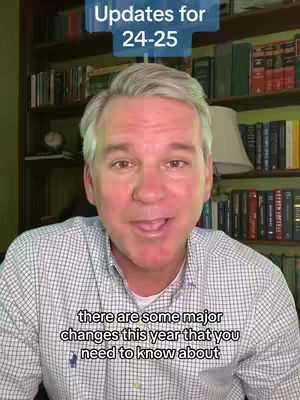 A middle-aged man with short gray hair is centered in the frame, smiling. The background consists of a bookshelf filled with books and a green wall. A blue rectangular text box at the top reads "Updates for 24-25". A lower text box states, "there are some major changes this year that you need to know about".
