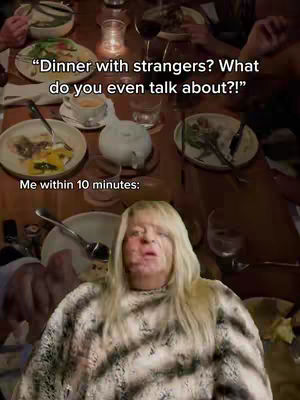The image shows a woman looking up with a concerned expression, positioned over a dining table setting filled with plates and glasses. Text overlays read, "Dinner with strangers? What do you even talk about?!" and "Me within 10 minutes:"