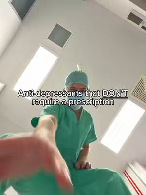 A low-angle shot from inside a clean, white room with overhead lights. A person in green surgical scrubs and a surgical cap reaches a hand toward the viewer. Text overlay at the bottom reads, 'Anti-depressants that DON'T require a prescription'.