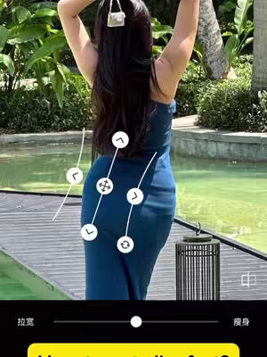 A woman is seen from the back, posing outdoors, with arms raised above her head. She wears a dark blue dress, and the background shows tropical plants and a body of water.