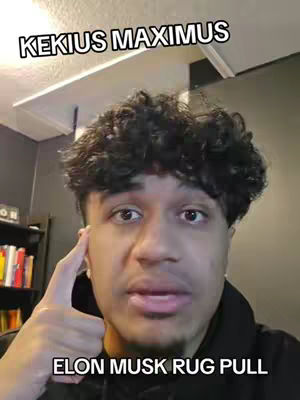A selfie-style shot featuring a young man with dark, curly hair against a somewhat cluttered background. He has a slightly anxious or concerned expression, with his index finger touching his temple. Text overlays at the top and bottom of the frame read 'KEKIUS MAXIMUS' and 'ELON MUSK RUG PULL,' respectively.