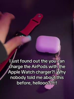 A dark surface with a red Apple Watch, a white AirPods case, and a hand with painted nails. Text overlay provides additional context.