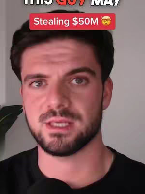 A close-up shot of a man with dark hair and a beard, appearing to be speaking. Above his head is a red banner with text and an emoji. The background is blurred, keeping the focus on the man.