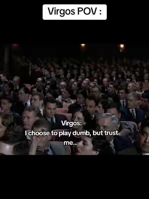 The cover image shows a scene from a movie with a large audience in an auditorium. Overlayed text at the top indicates 'Virgos POV', with additional text below stating 'Virgos: I choose to play dumb, but trust me...'