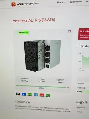 The cover image shows a screenshot of a website displaying an Antminer AL1 Pro (16.6Th) crypto mining device. The device is centered and takes up a significant portion of the frame. It has two black fan units on the left and a silver case on the right with a row of fans. Details related to the device performance and profitability are visible alongside.