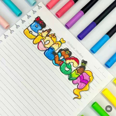 A colorful image of a piece of lined paper with the word "Disney" creatively written on it, each letter is styled to represent a different Disney character, with markers of various colors surrounding the paper. The background is a light wooden surface.