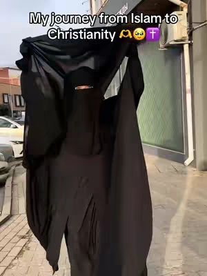 A person wearing a black niqab, with a title overlayed on the top part of the imahe that says, "My journey from Islam to Christianity.