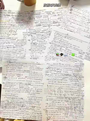 A top-down view of multiple sheets of paper covered in handwritten notes, diagrams, and equations. The papers are arranged in a somewhat scattered layout on a white surface, presumably a desk or table. Various colors of ink are visible, with the primary colors being pink and black against the white paper. The layout is a typical study environment, with the notes suggesting a focus on detailed learning or problem-solving.