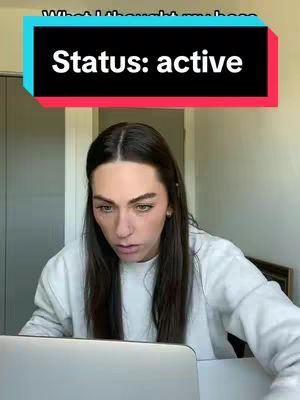 A woman is sitting in front of a laptop, looking down with a concerned expression. Above her head is a text overlay on a color block background reading “Status: active”. The background is a light-colored wall with a glimpse of a closed door on the left side.