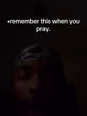 A dark cover image featuring the upper half of a person's face, with the head slightly angled towards the left. The background is black, and the text overlay in white, positioned at the top, reads, 'remember this when you pray.'. The person is wearing a patterned head covering.