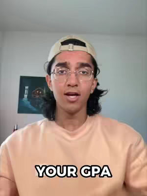 A person with glasses and a cap is looking towards the camera with an open mouth over a white background with a painting behind him and a hook text on bottom