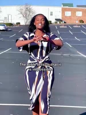 A shot of a woman standing in a parking lot with the sun shining. She is wearing a dress with stripes and the overlay text describes the message.