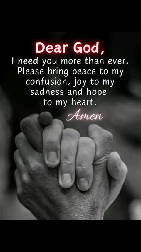 A black-and-white image features a person's hands clasped in prayer, with a soft focus background. Overlayed text in red and white reads "Dear God," followed by a prayer for peace, joy, and hope. The word "Amen" is written in a cursive font at the bottom.