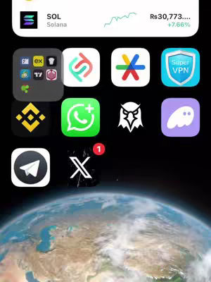 The cover image shows a smartphone screen displaying various app icons arranged on a black background over a backdrop of a blurred image of the Earth from space. Several app icons are visible, including the Solana logo, a VPN shield, and social media and finance app icons. A notification badge with a '1' is present on one of the app icons. In the top-right corner is financial information.