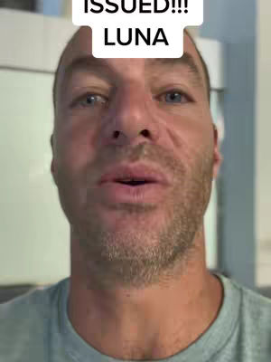 The cover image features a close-up shot of a man's face. Overlayed text, which appears in a white box, reads "ISSUED!!! LUNA". The man is looking directly at the camera with a neutral expression. The background appears to be an interior, possibly a home or office setting.