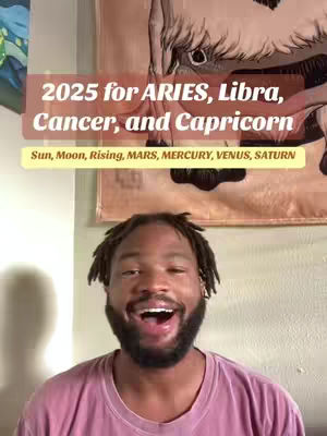 A man with dreadlocks and a beard is smiling widely at the camera. Above him is a banner that says '2025 for ARIES, Libra, Cancer, and Capricorn.'